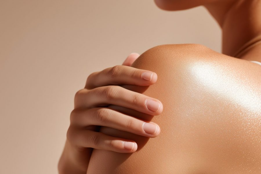 Beautiful Young Woman with Clean Fresh Skin. Facial treatment. Cosmetology, beauty, and spa. A nice and attractive girl with a pleasant smile.